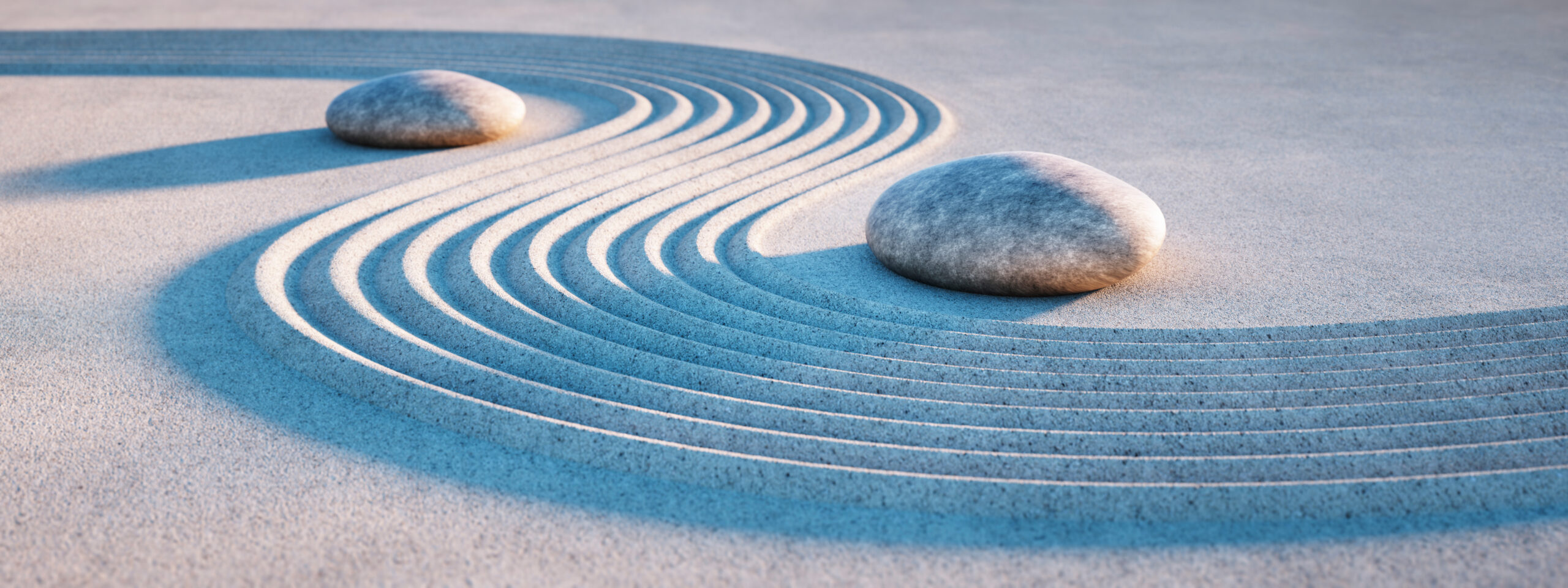 two stones and lines ind sand
